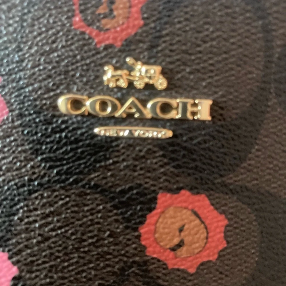 Coach Brown Crossbody Bag with Floral Accents like new